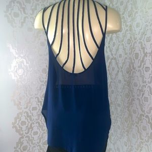 Naked Zebra blouse with a darling cut out back sz Small.. ENC